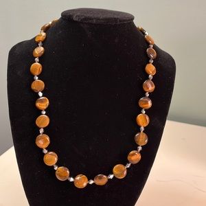 N21. Tigers eye necklace.